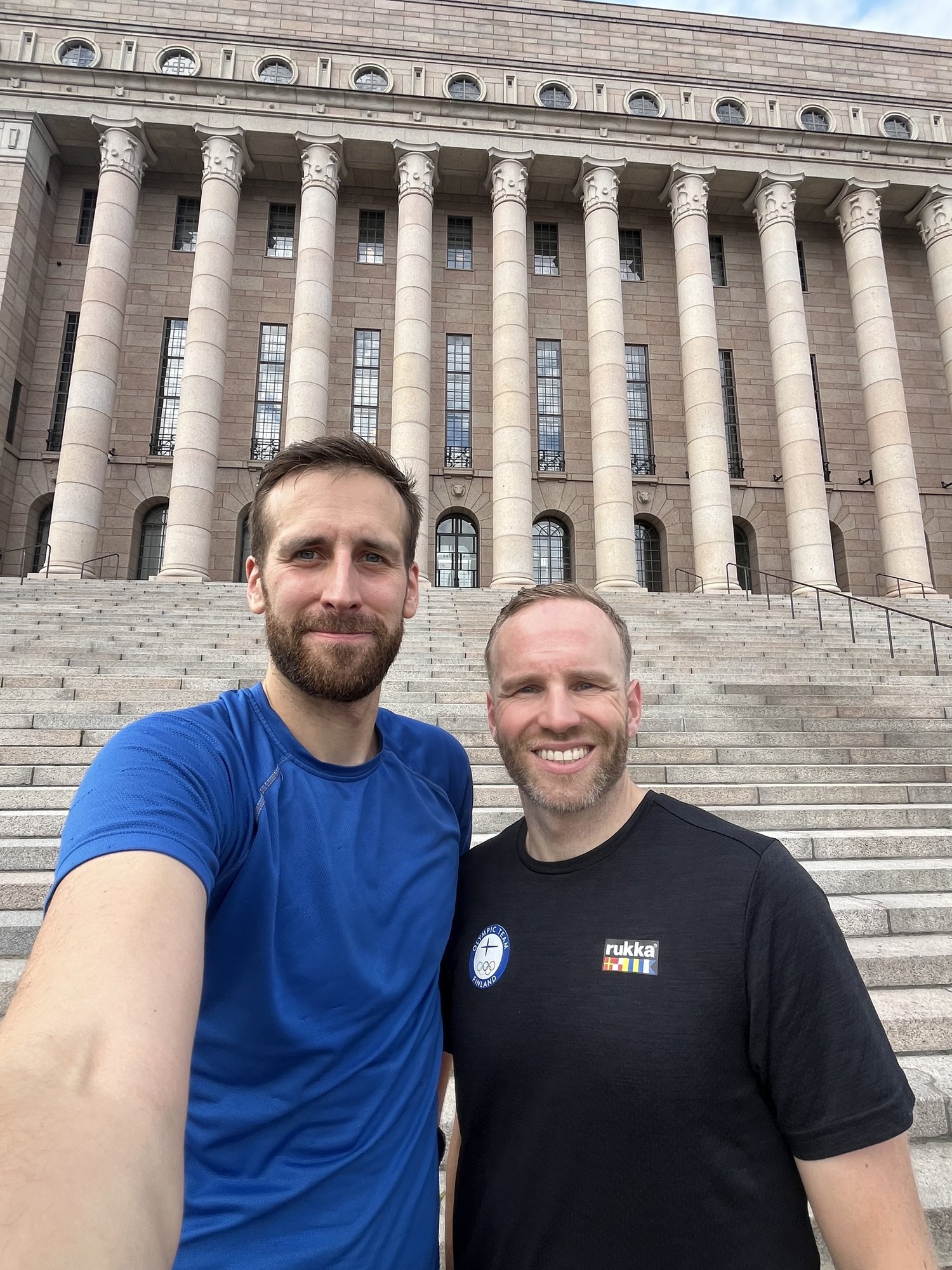 Jaakko Sahimaa and Mika Poutala in front of the Finnish Parliament